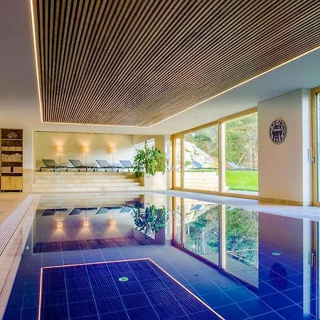 בקתה Design-chalet Mit Teilseeblick, Pool, & Restaurant לוכאו ביי ברגנץ